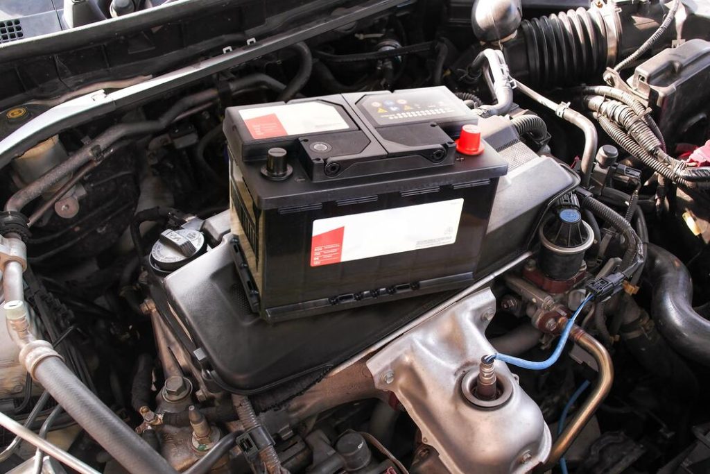 car-battery-on-engine-bay-maintenance-free-battery-for-car-electrical-system-and-maintenance-photo